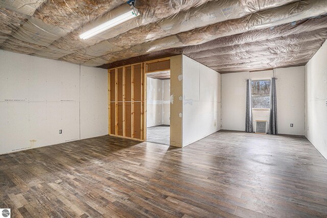 4676 W Mcmillan Rd, Muskegon, MI 49445 - basement with wood finished floors