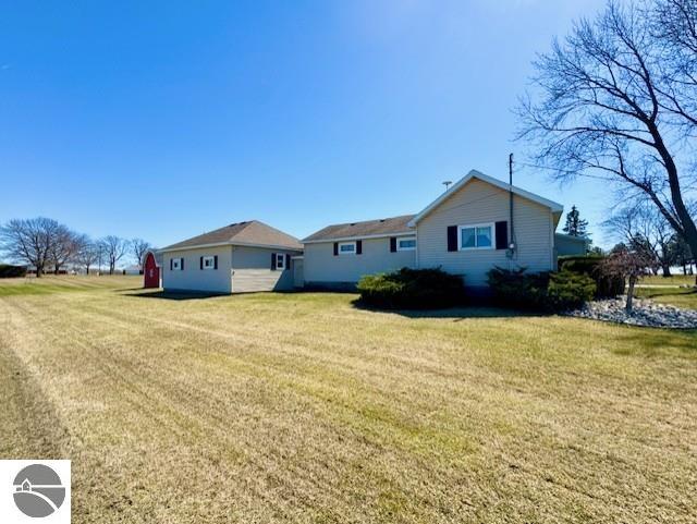 1705 S State Rd, Ithaca, MI 48847 - exterior space featuring a lawn