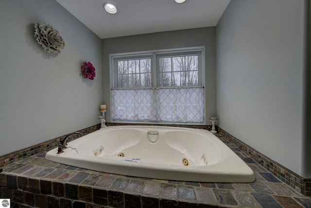 full bathroom with a jetted tub and recessed lighting