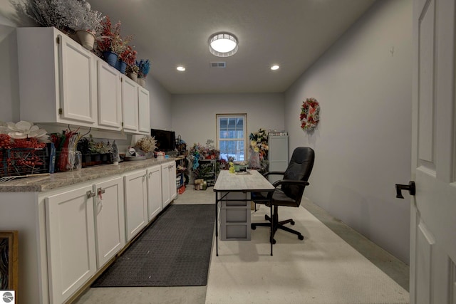 office area with visible vents and recessed lighting