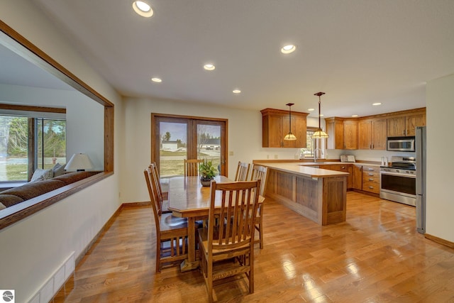 1339 Killdeer Ln, Kingsley, MI 49649 - dining space featuring visible vents, baseboards, and plenty of natural light