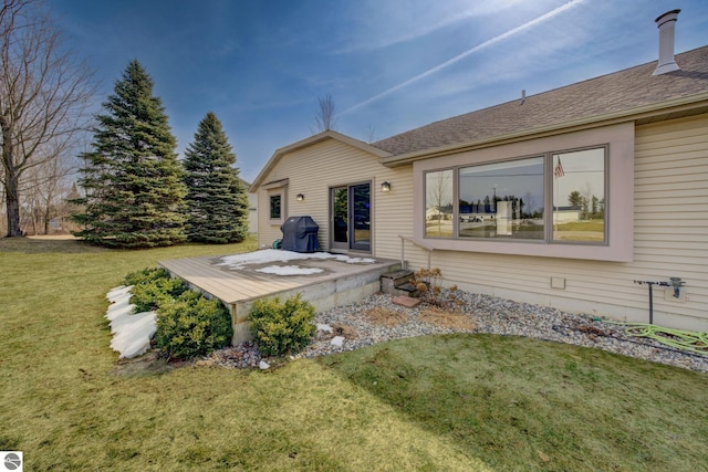 1339 Killdeer Ln, Kingsley, MI 49649 - rear view of house with a yard, a wooden deck, and a shingled roof