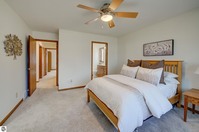 1339 Killdeer Ln, Kingsley, MI 49649 - bedroom featuring ensuite bathroom, baseboards, a ceiling fan, and light carpet