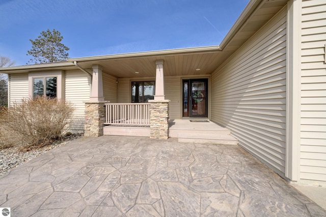 1339 Killdeer Ln, Kingsley, MI 49649 - view of exterior entry featuring a porch