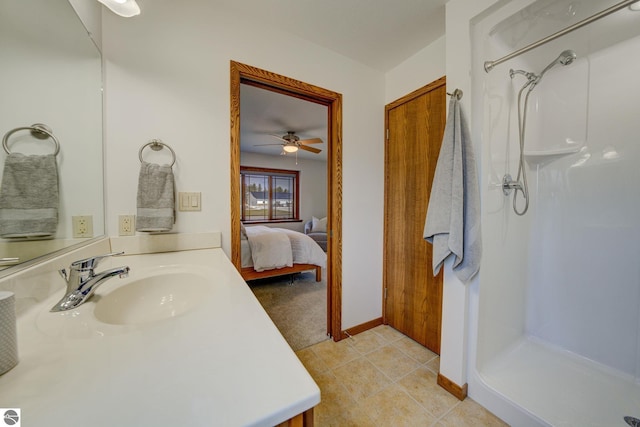 1339 Killdeer Ln, Kingsley, MI 49649 - ensuite bathroom with a shower stall, tile patterned floors, vanity, and connected bathroom