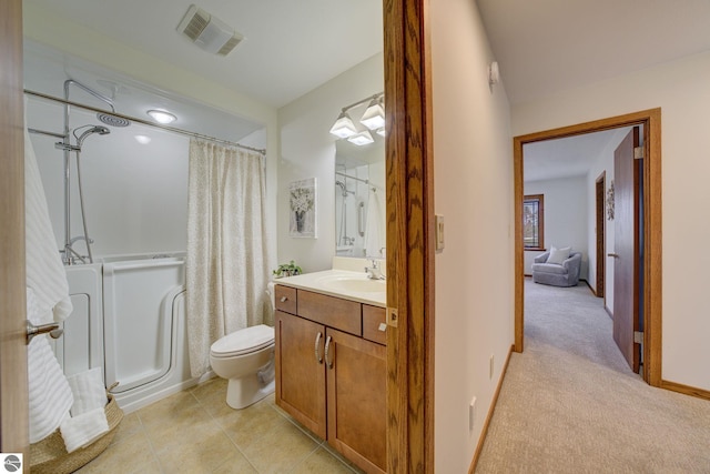 1339 Killdeer Ln, Kingsley, MI 49649 - bathroom featuring visible vents, toilet, curtained shower, and vanity