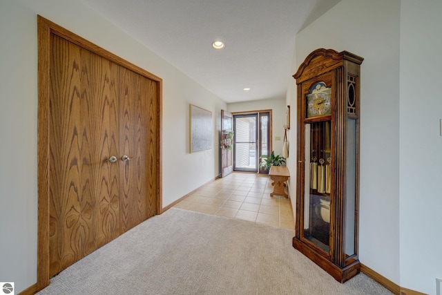 1339 Killdeer Ln, Kingsley, MI 49649 - corridor with light tile patterned floors, baseboards, recessed lighting, and light colored carpet