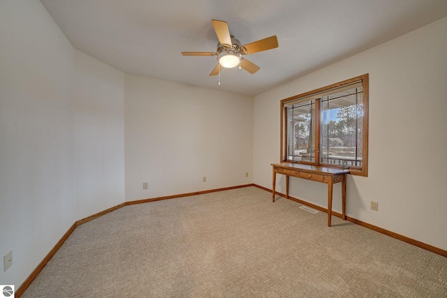 1339 Killdeer Ln, Kingsley, MI 49649 - unfurnished room featuring light carpet, visible vents, baseboards, and ceiling fan