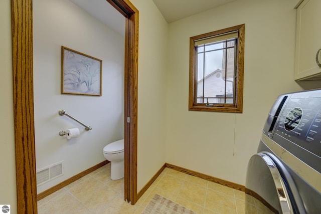 1339 Killdeer Ln, Kingsley, MI 49649 - laundry room with laundry area, light tile patterned floors, baseboards, and visible vents