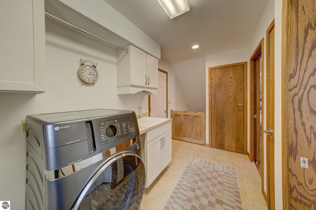 1339 Killdeer Ln, Kingsley, MI 49649 - laundry room with recessed lighting, light tile patterned flooring, a sink, cabinet space, and washer and clothes dryer