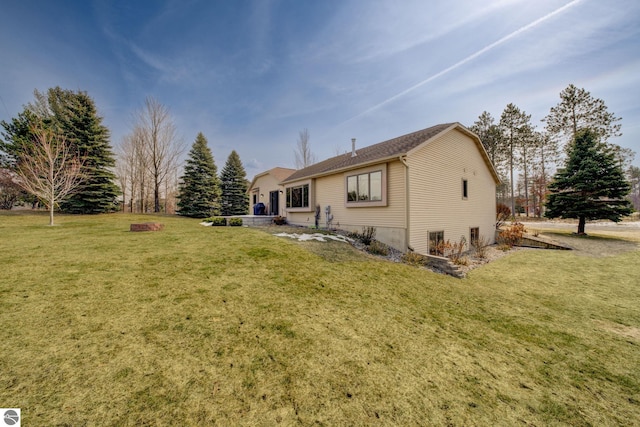 1339 Killdeer Ln, Kingsley, MI 49649 - back of property with a lawn