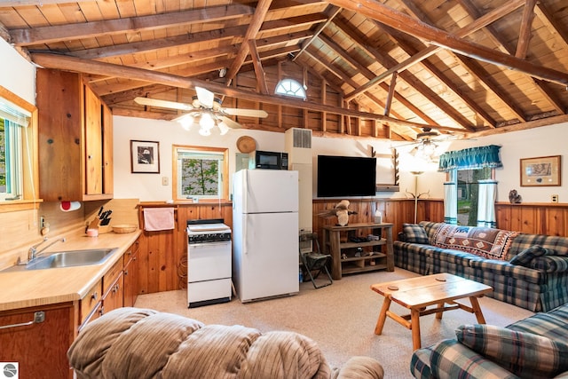 living room with light carpet, wood ceiling, vaulted ceiling with beams, and a wainscoted wall