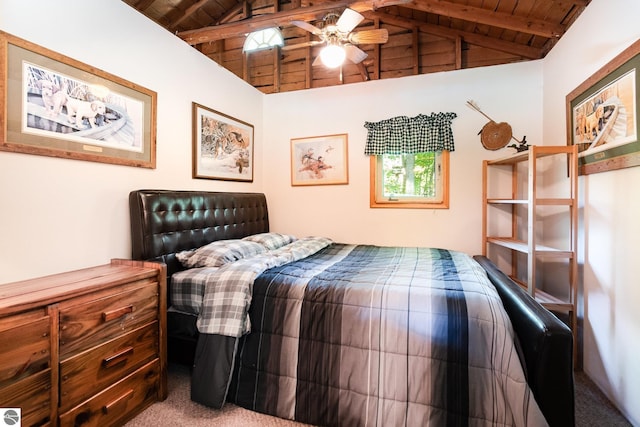 carpeted bedroom with wooden ceiling, beamed ceiling, ceiling fan, and high vaulted ceiling