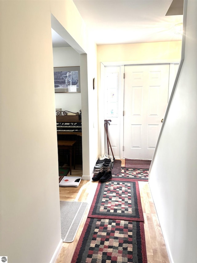 7119 Lakewood Dr, Oscoda, MI 48750 - interior space with baseboards and wood finished floors