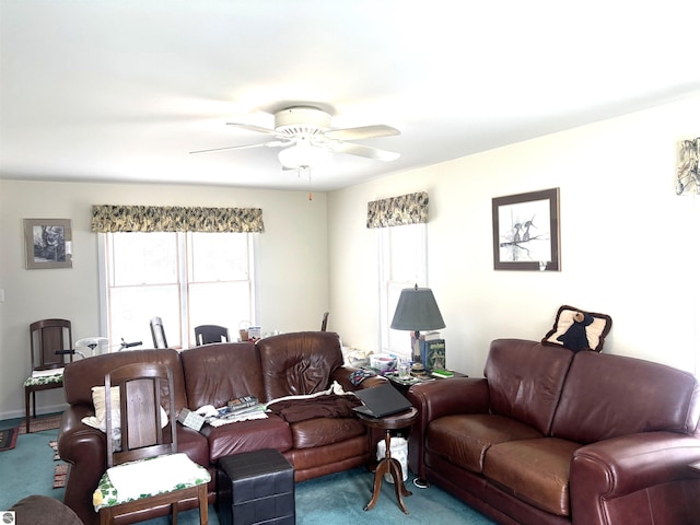 7119 Lakewood Dr, Oscoda, MI 48750 - carpeted living area featuring ceiling fan