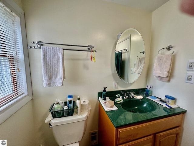 7119 Lakewood Dr, Oscoda, MI 48750 - bathroom with vanity and toilet