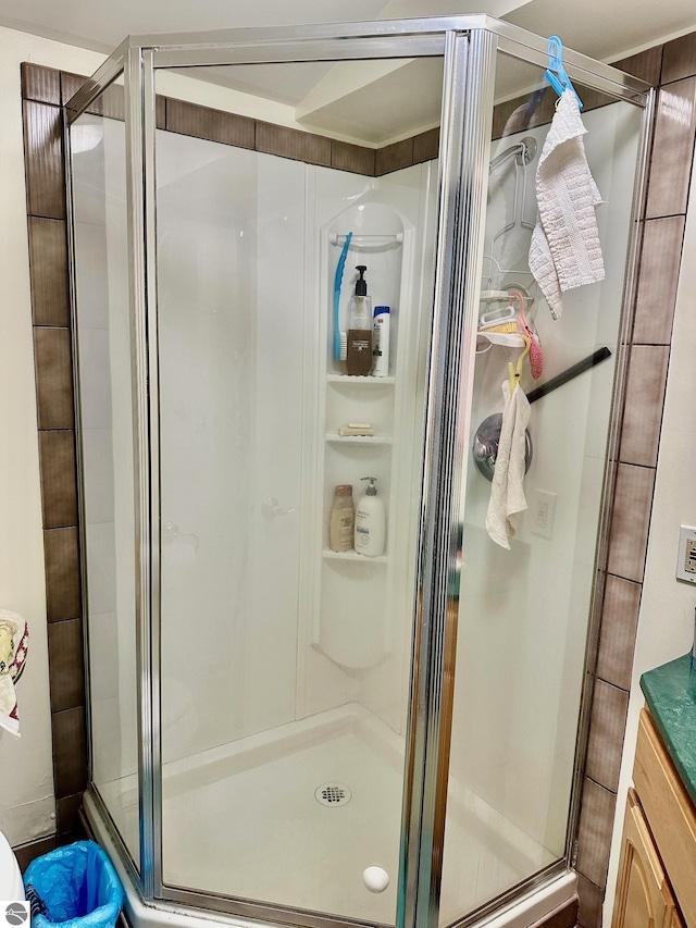 7119 Lakewood Dr, Oscoda, MI 48750 - bathroom with a stall shower and vanity