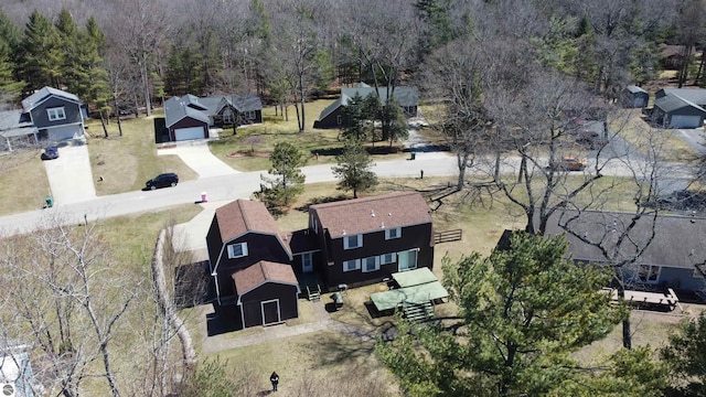 7119 Lakewood Dr, Oscoda, MI 48750 - bird's eye view with a view of trees