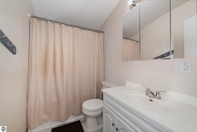 316 Grafton Ave, Alma, MI 48801 - bathroom with toilet, curtained shower, and vanity