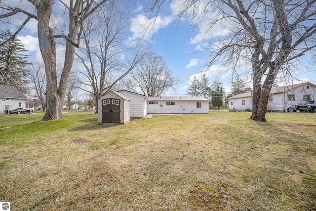 316 Grafton Ave, Alma, MI 48801 - view of yard featuring a shed and an outbuilding
