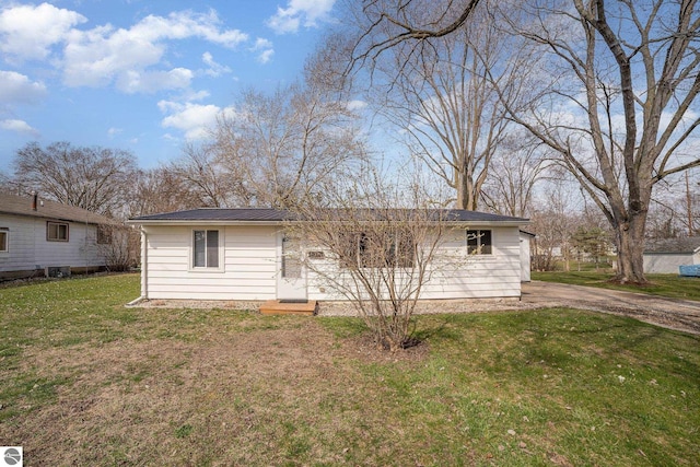 316 Grafton Ave, Alma, MI 48801 - exterior space with a front yard and metal roof