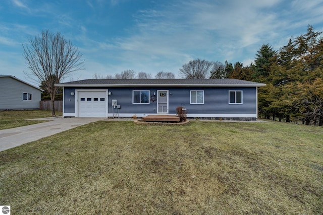 ranch-style home featuring driveway, fence, a front yard, and a garage