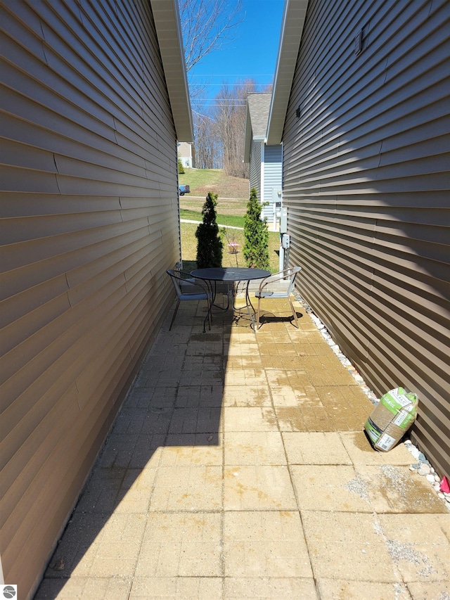 921 Cobalt St Unit 48, Traverse City, MI 49696 - view of patio / terrace with outdoor dining area