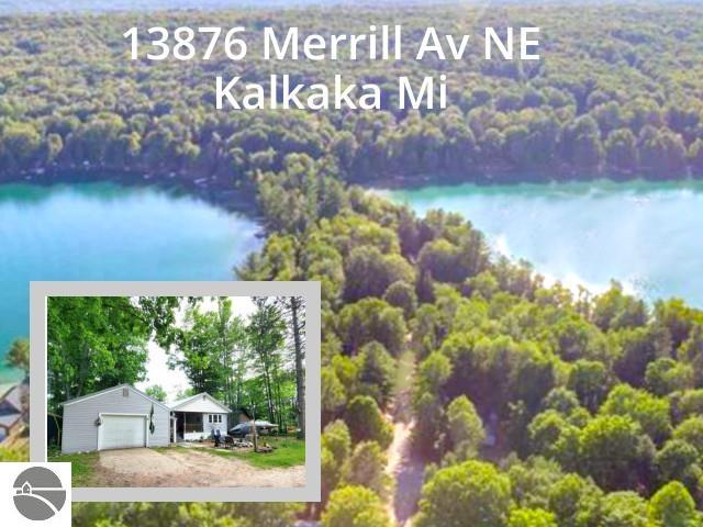 13876 Merrill Ave, Kalkaska, MI 49646 - birds eye view of property with a forest view and a water view