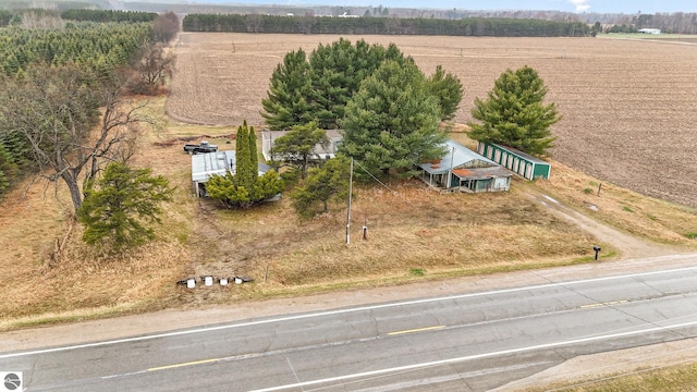 birds eye view of property featuring a rural view