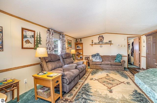 living area with vaulted ceiling, a textured ceiling, wood finished floors, and ornamental molding