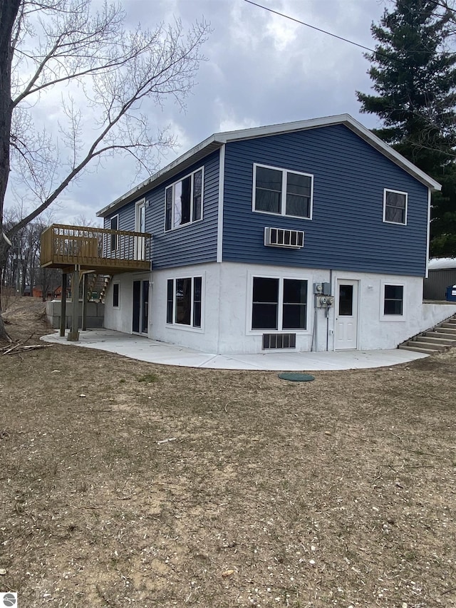 7228B S M-88, Bellaire, MI 49615 - back of property with a patio and a deck