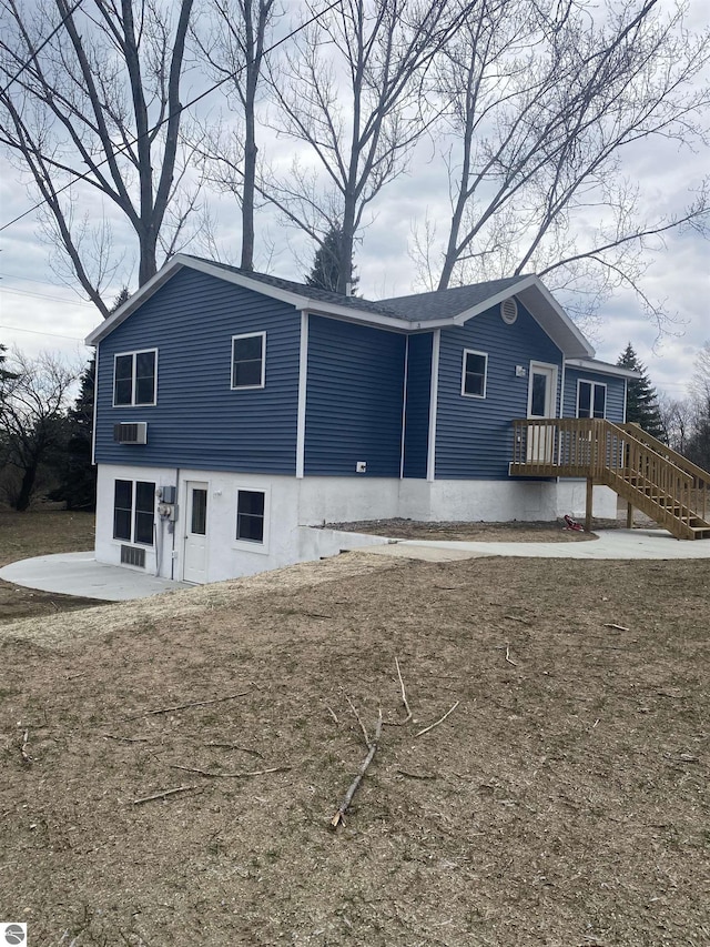 7228B S M-88, Bellaire, MI 49615 - view of front of home featuring a patio