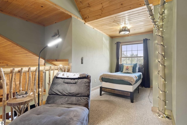 carpeted bedroom with wooden ceiling, baseboards, and crown molding