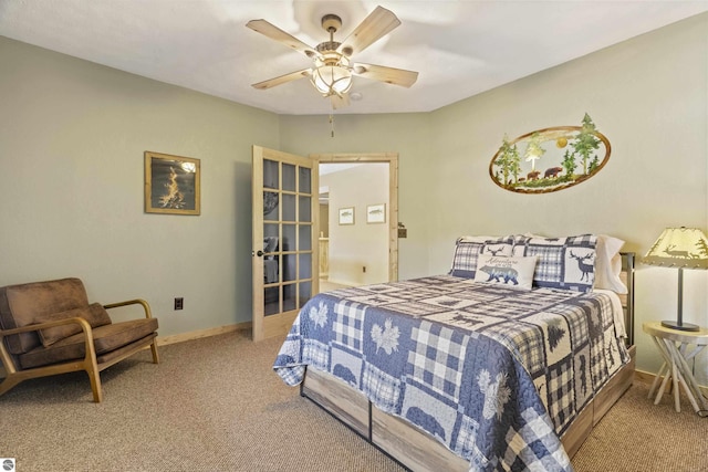 carpeted bedroom featuring a ceiling fan, baseboards, and french doors