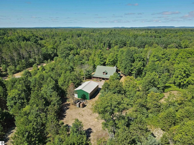 bird's eye view with a forest view