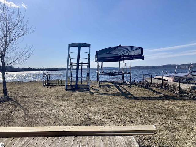 dock area featuring a water view and boat lift