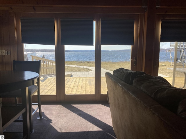 interior space featuring a water view and plenty of natural light