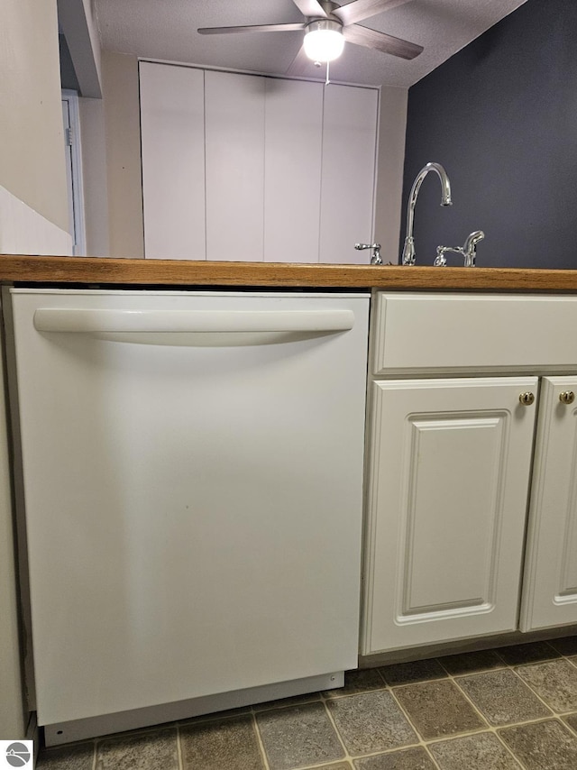 100 Fourth Ave Unit E-3, Tawas City, MI 48763 - interior space featuring ceiling fan, white dishwasher, and a sink