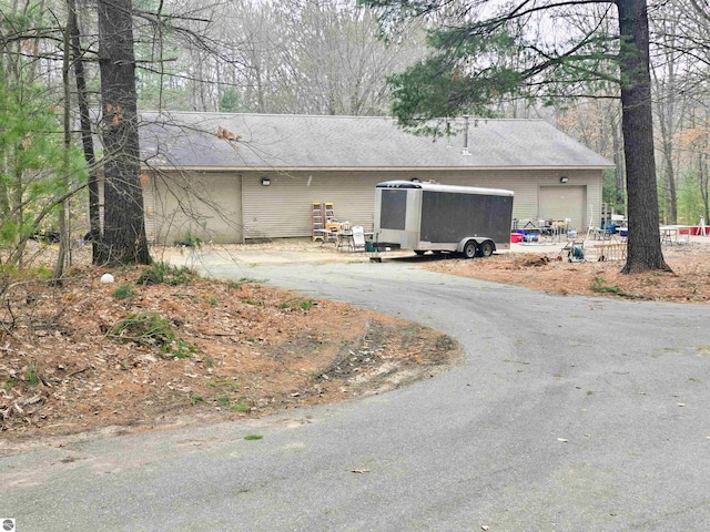 exterior space with a garage