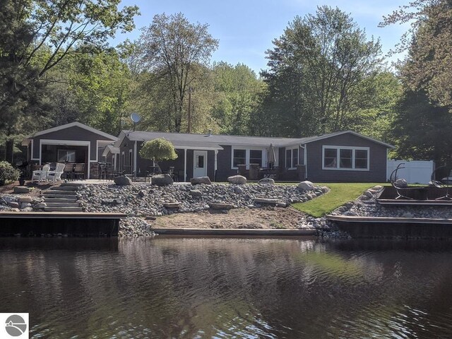 3901 W Thendara Dr, Gladwin, MI 48624 - back of property with a water view
