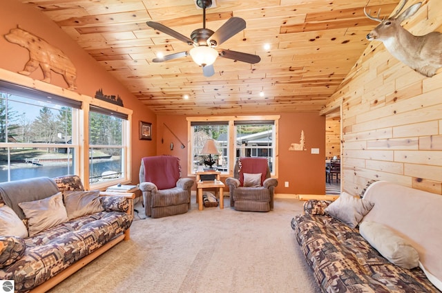 3901 W Thendara Dr, Gladwin, MI 48624 - carpeted living area featuring wooden ceiling, lofted ceiling, and a ceiling fan
