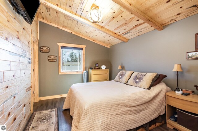 3901 W Thendara Dr, Gladwin, MI 48624 - bedroom featuring radiator, vaulted ceiling with beams, wooden ceiling, baseboards, and dark wood-style floors