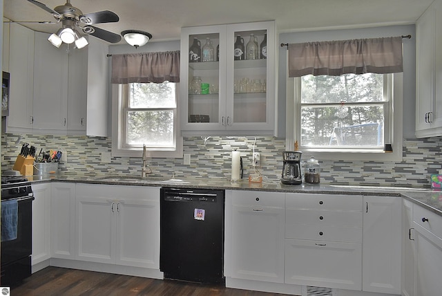 kitchen featuring white cabinets, decorative backsplash, ceiling fan, and black appliances