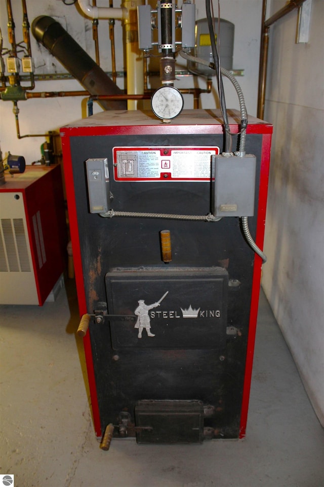 utility room with a heating unit