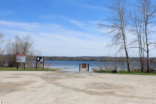 4290 Johnson Rd, Frankfort, MI 49635 - view of dock featuring a water view