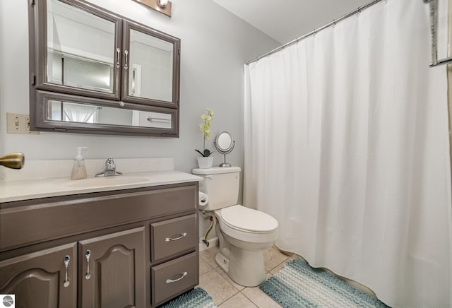 full bath featuring tile patterned floors, vanity, and toilet