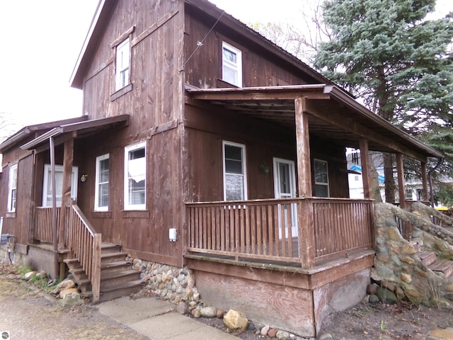 116 N Main St, Saint Louis, MI 48880 - view of property exterior featuring a porch