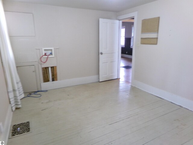 116 N Main St, Saint Louis, MI 48880 - spare room with baseboards and visible vents