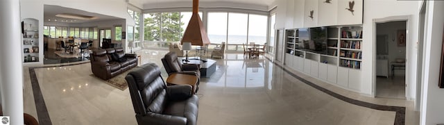 5343 Michibay Dr, Manistique, MI 49854 - living room featuring a water view