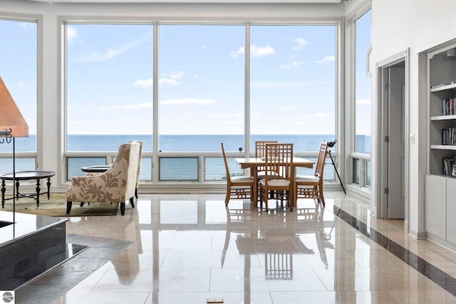 5343 Michibay Dr, Manistique, MI 49854 - sunroom featuring a wealth of natural light and a water view